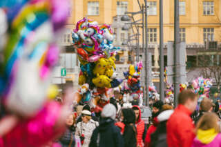 First of May balloons and people on the streets in Vaasa